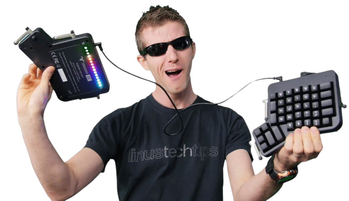 Linus from Linus Tech Tips raising an Ergodox-EZ Shine
