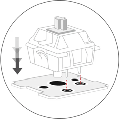 A new keyswitch being aligned to the holes of the socket