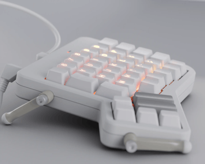 Side view of a white Ergodox-ez with white backlit keycaps